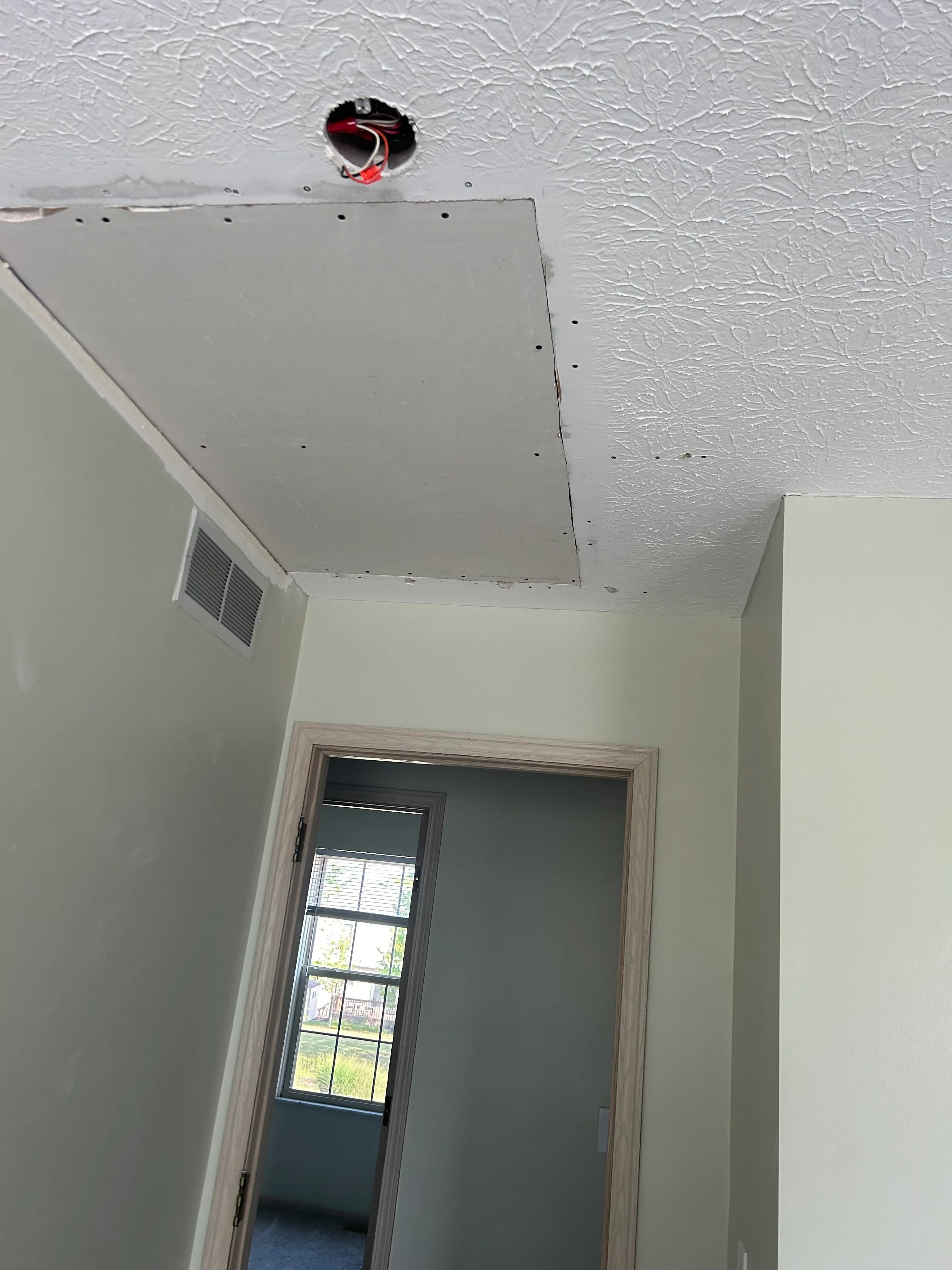 In-progress drywall repair